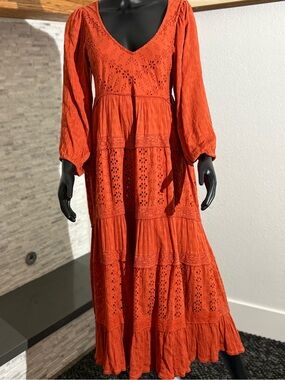 Free People Mockingbird maxi dress in a burnt orange or rust color